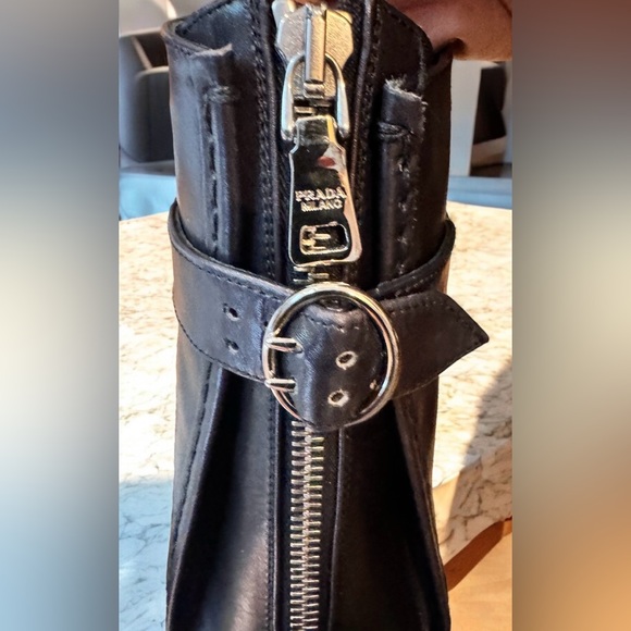 NWOT. Prada black leather boots with silver hardware. Front zipper - Picture 2 of 12